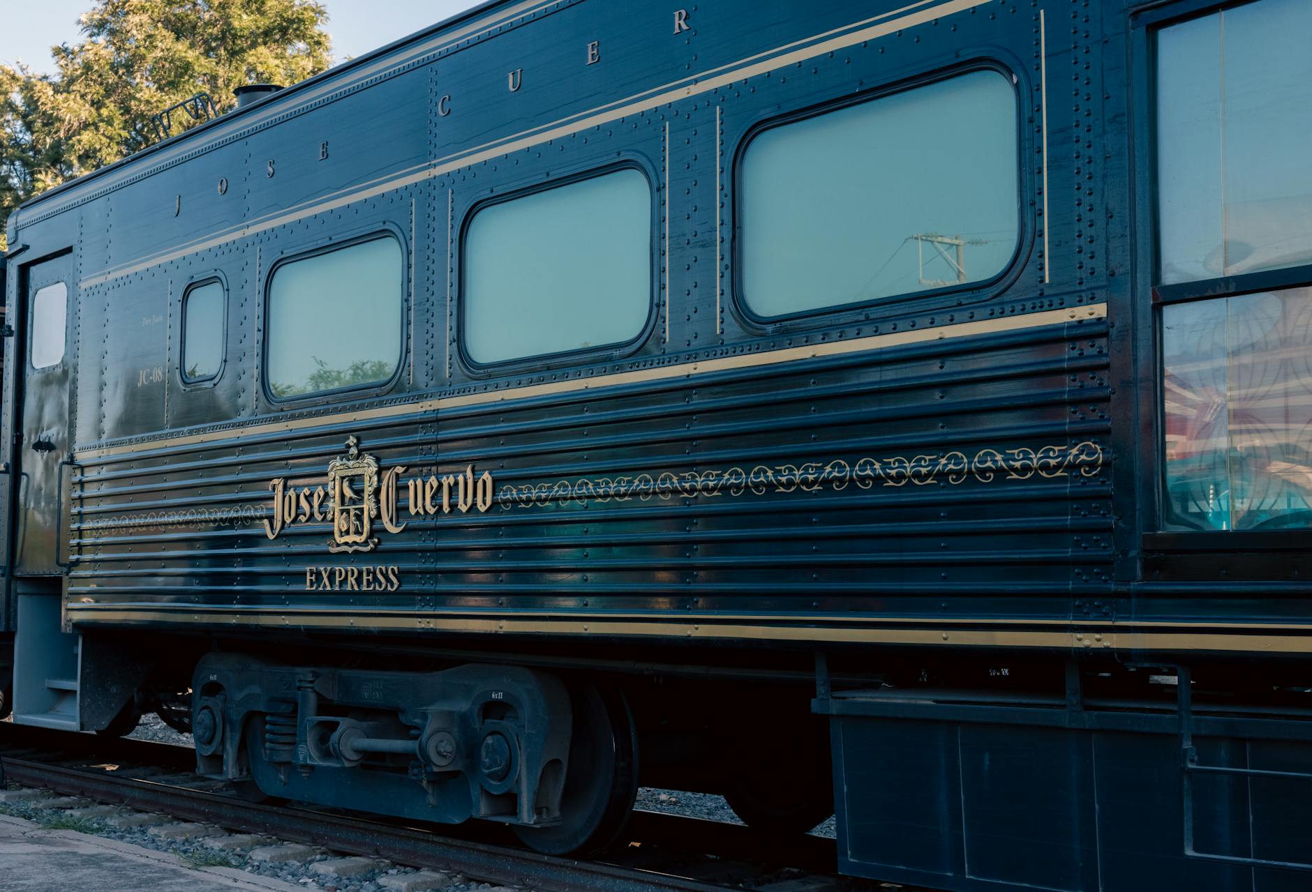 Side view of Jose Cuervo Express train showcasing vintage design in Tequila, Mexico.